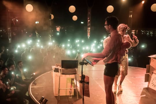 Miss Behave leads an invasion onto her own stage at the climax of her show