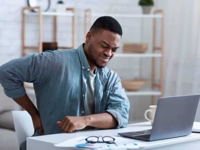 Back pain from sitting desk London