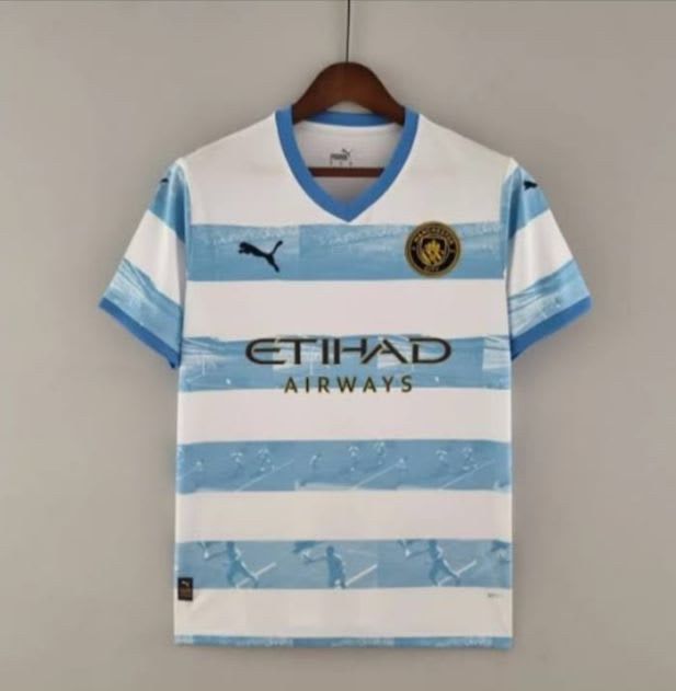 Camisa Manchester City listrada azul-clara e branca, foto 1