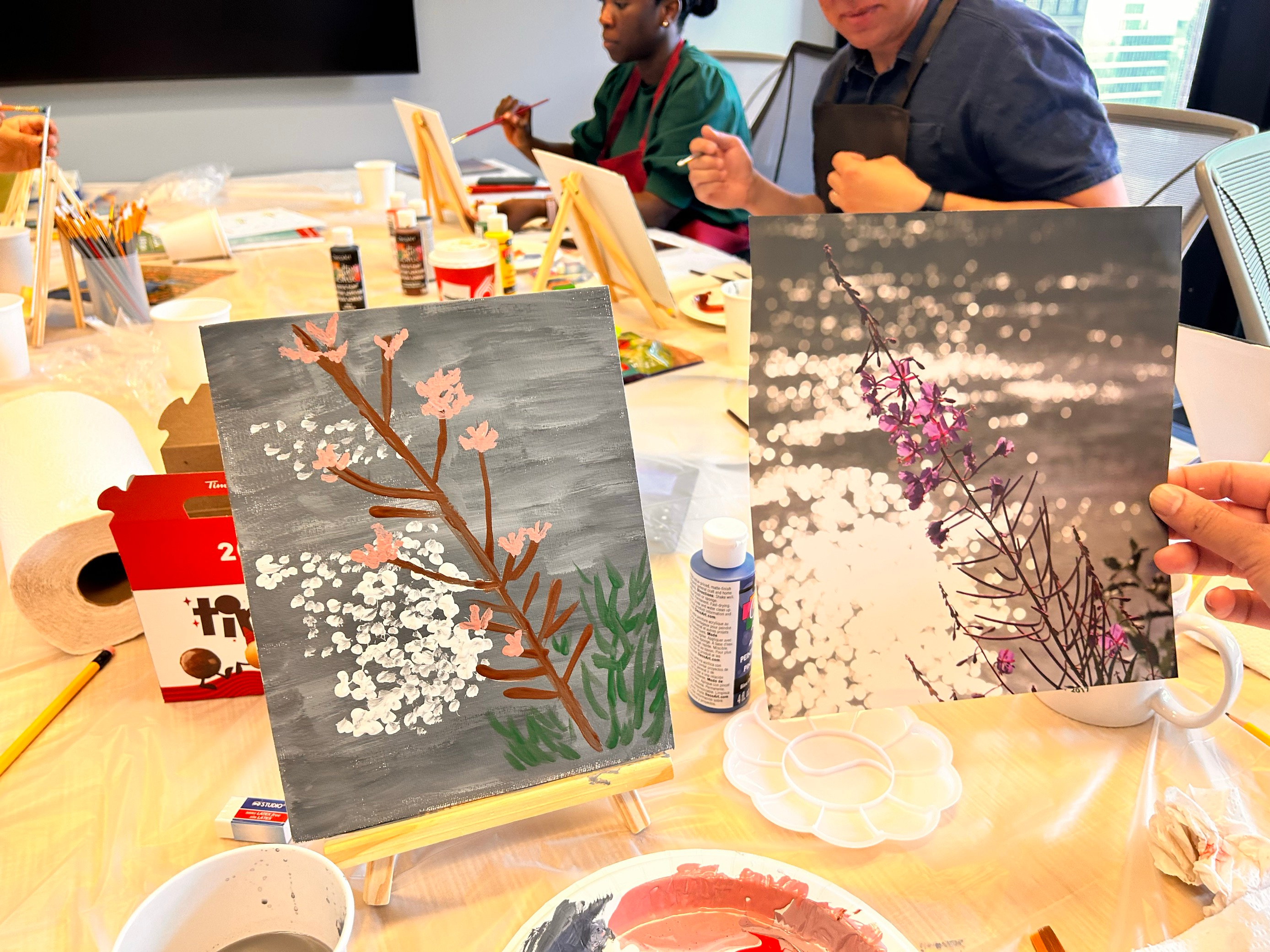 Finished painting of the pink blossom juxtaposed next to the reference image.