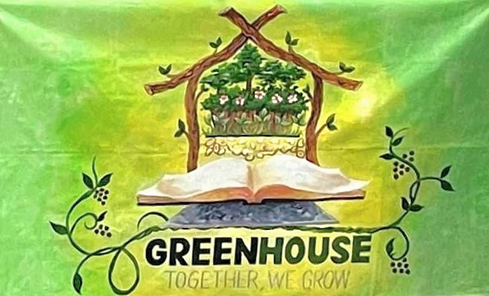A banner created for our church family day 2024. On top of a solid ground and an open Bible is a house containing seeds, saplings, shrubs, and trees to signifying a safe environment for growth.