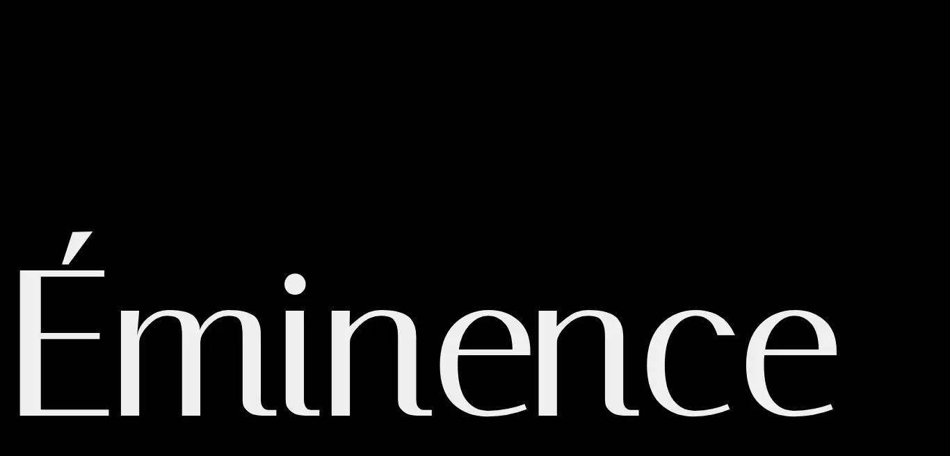 A typographic reveal of the brand name 'Éminence' in pristine white serif characters against a deep black void. A minimalist composition that evokes the structural sophistication of a French tailoring campaign.