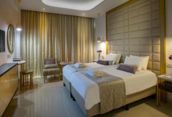 Фото TWIN ROOM INLAND/SEA VIEW