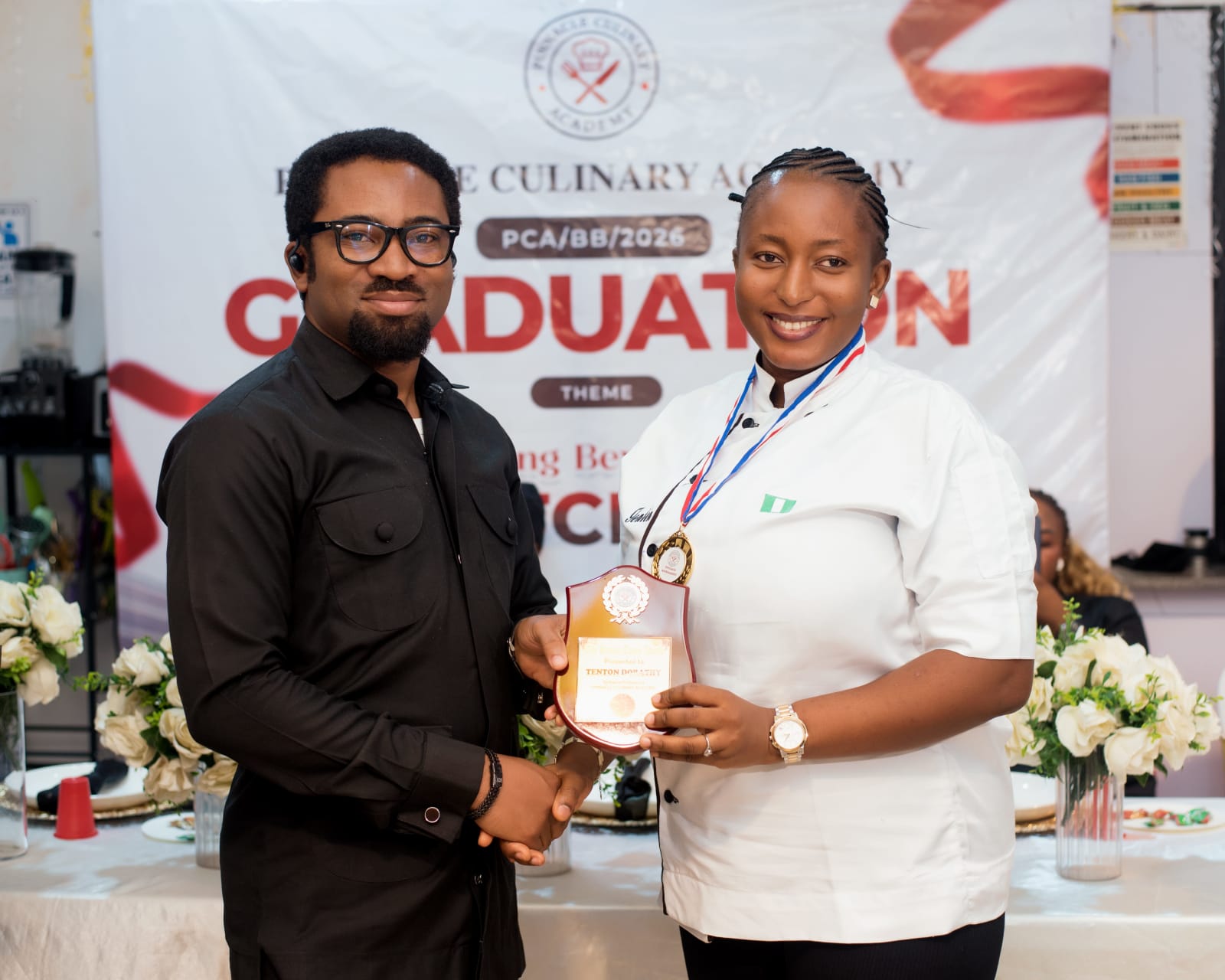 Graduates celebrating at the academy