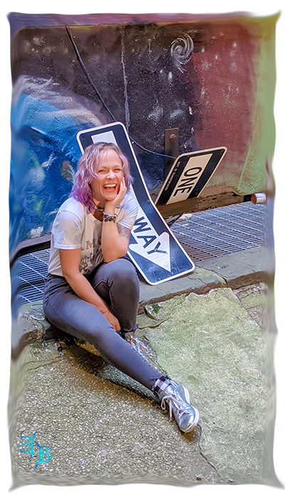 portrait of Elyza seated smiling