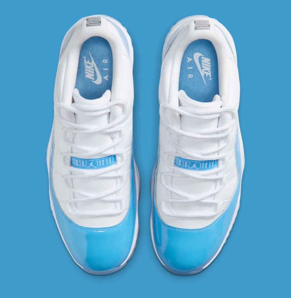 Air Jordan 11 Low University Blue 2026 top down view showing white mesh and lace detailing