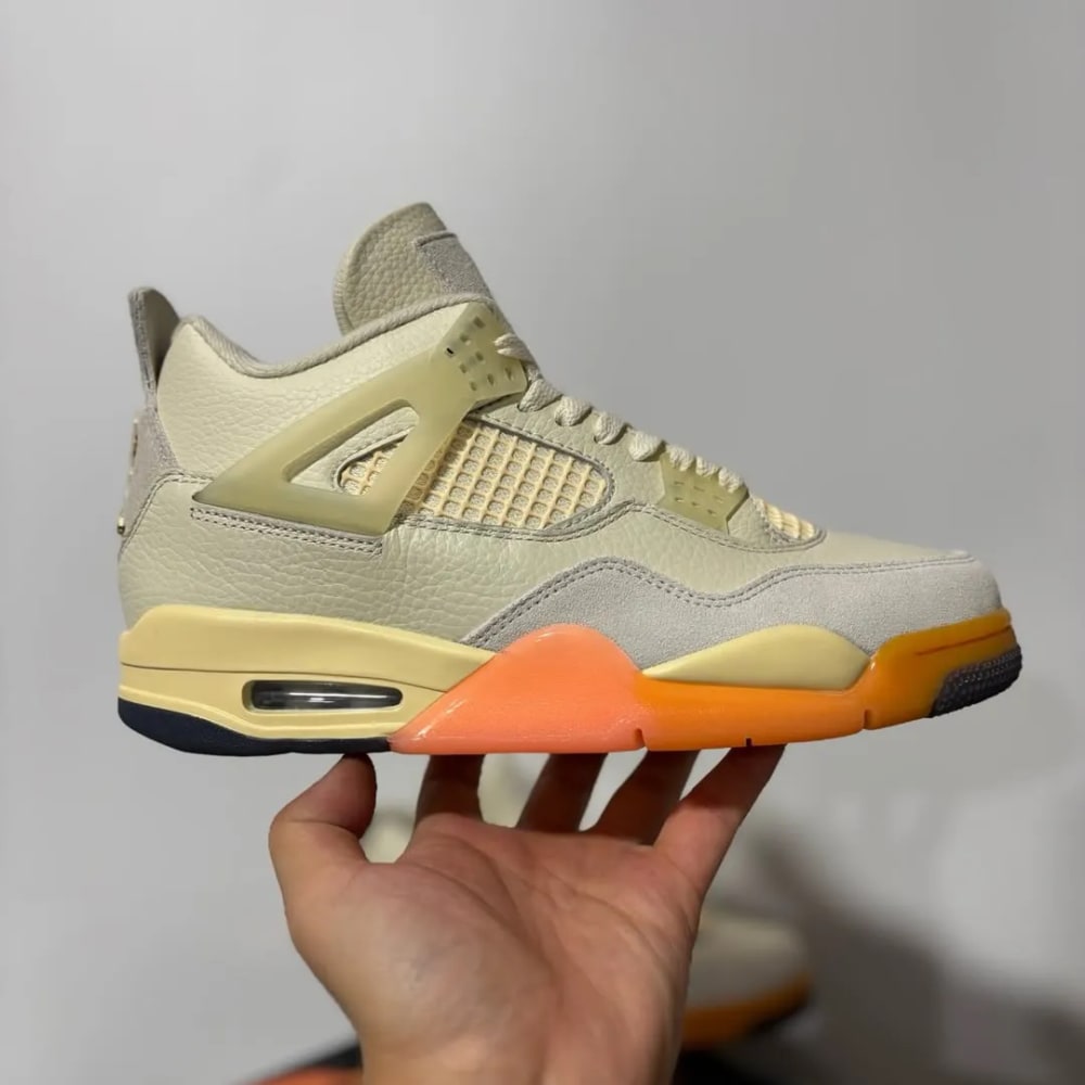 Air Jordan 4 Birds of Paradise HV0823-101 lateral view showing Coconut Milk leather upper and tropical outsole