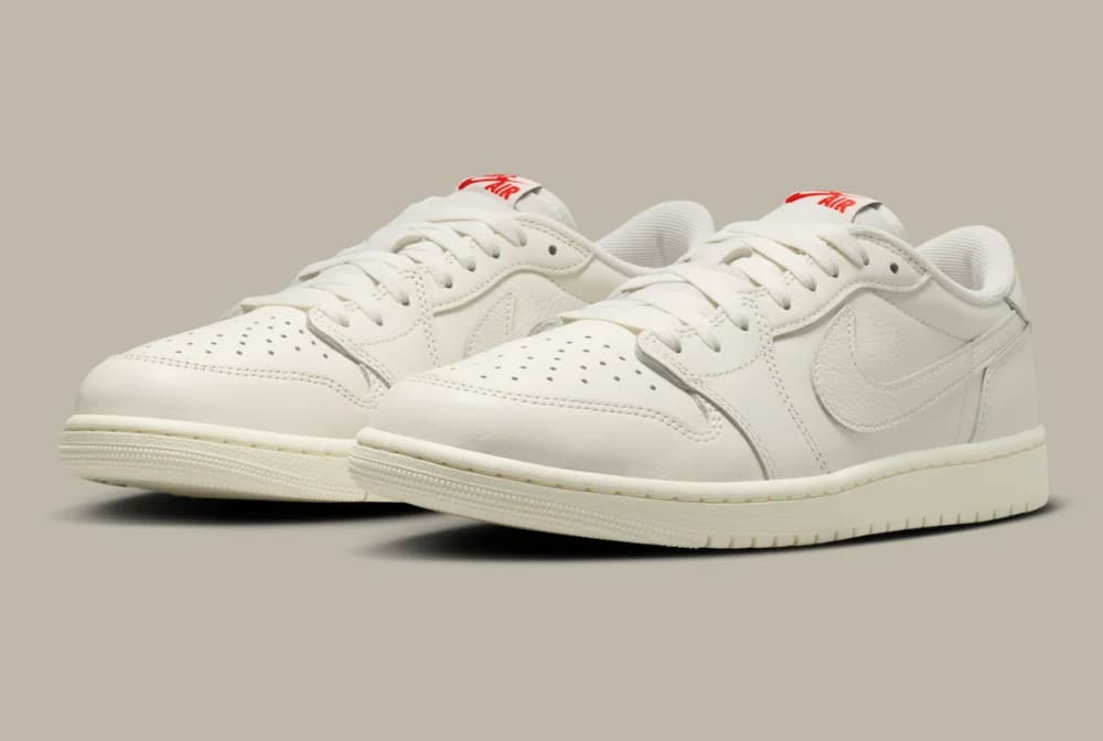 Air Jordan 1 Low OG Sail HQ6998-100 alternate angle - University Red Swoosh detail and OG-spec toe box 2026