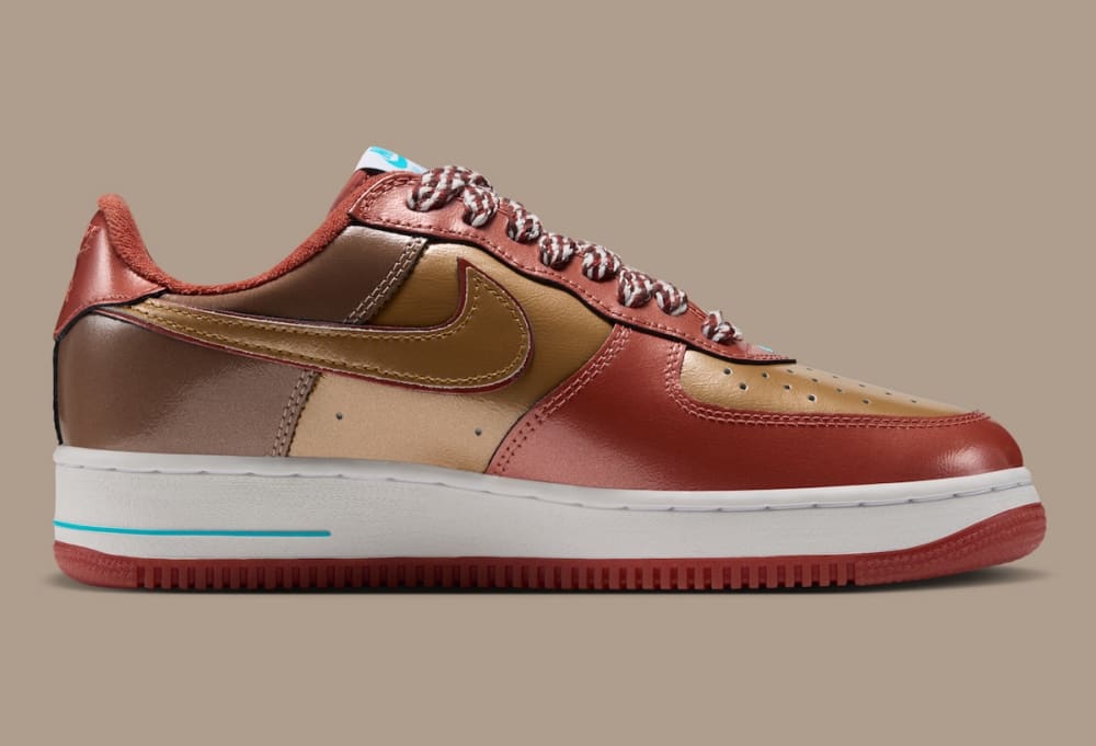 NIGO x j-hope Air Force 1 '01 medial side showing metallic gold Swoosh, brown heel panels and red and white rope laces