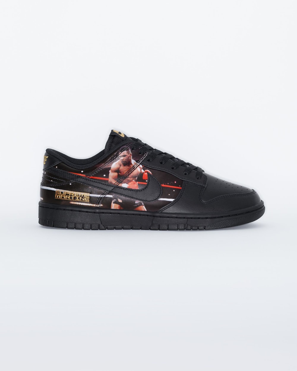 Side profile of the Supreme Martine Rose Nike Dunk Low Mike Tyson showing gold Supreme Martine lettering and black Swoosh over the photo panel