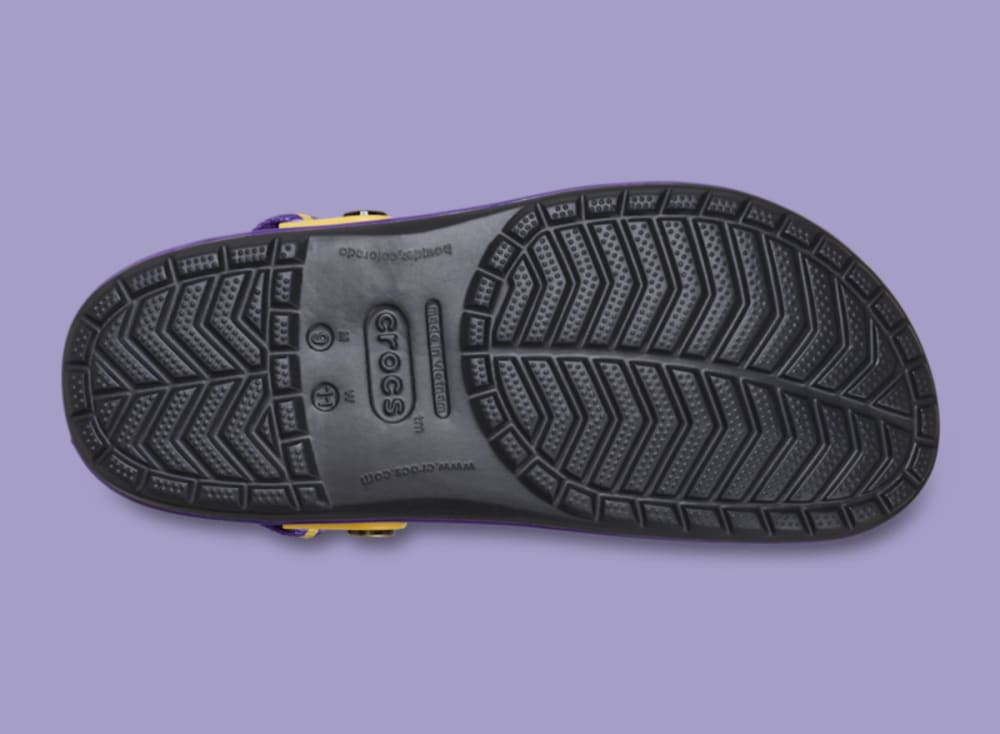 Outsole of the NBA x Crocs Crocband Clog Los Angeles Lakers 212800-90H showing black tread, Crocs logo and made in Vietnam mark