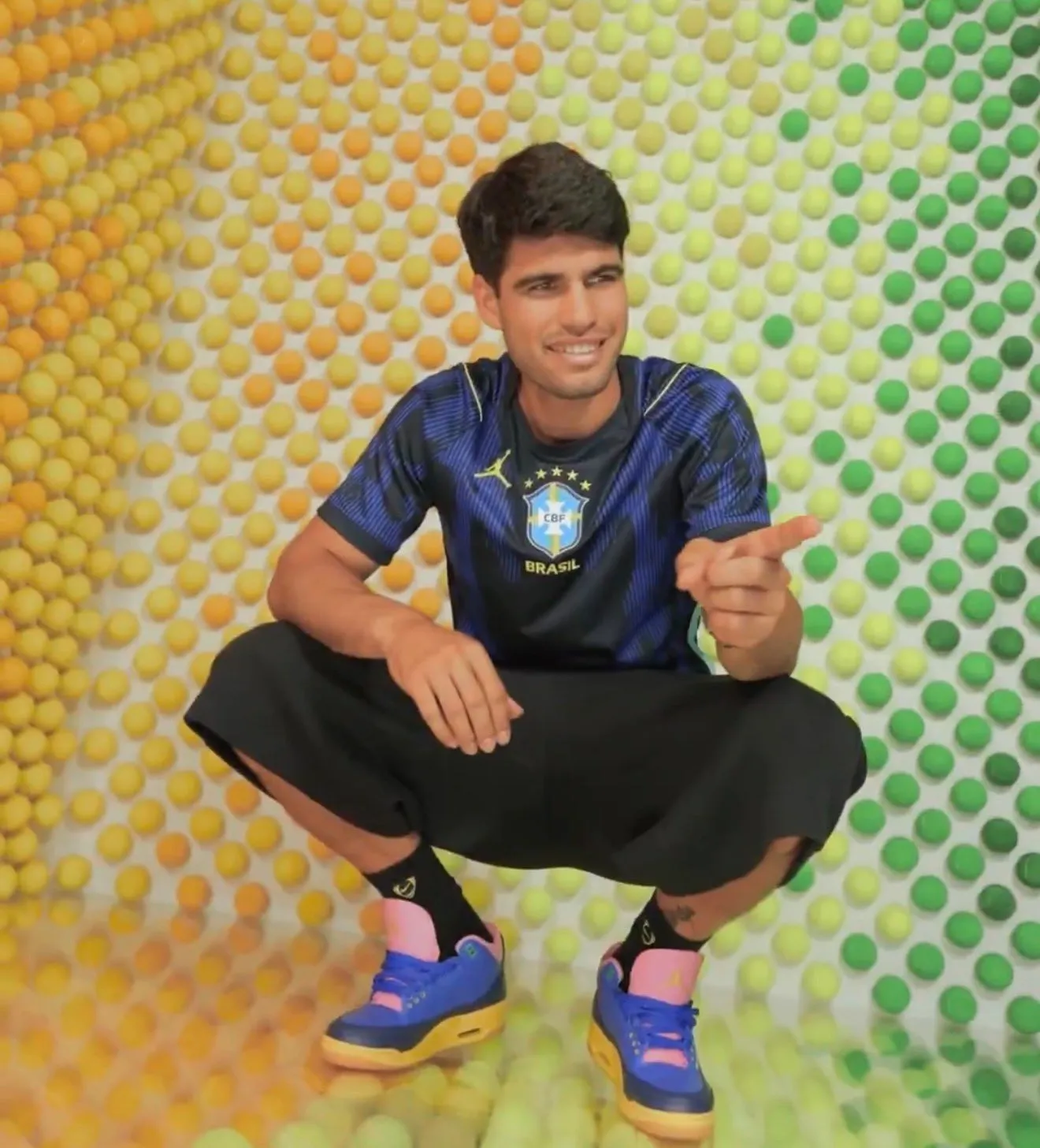 Carlos Alcaraz wearing Air Jordan 3 Brazil World Cup 2026 colourway on foot