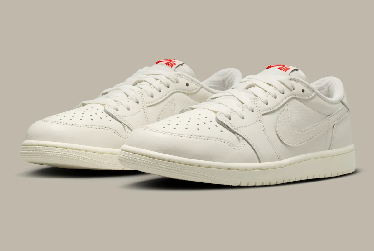 Air Jordan 1 Low OG Sail HQ6998-100 alternate angle - University Red Swoosh detail and OG-spec toe box 2026