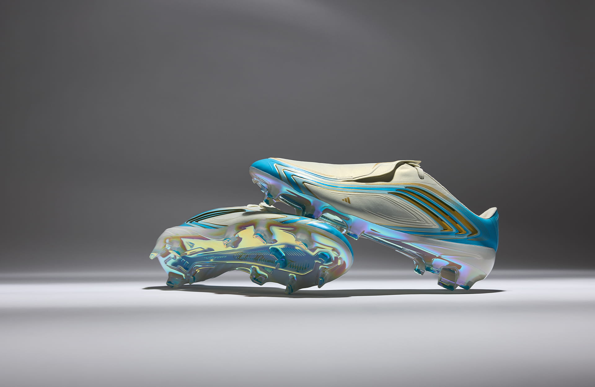 Adidas F50 El Ultimo Tango worn at World Cup 2026 — ivory and gold Argentina boot on pitch
