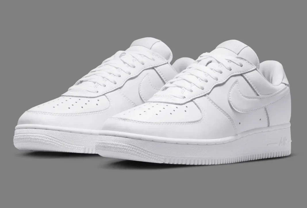 Nike Air Force 1 Low '01 Triple White IV4501-100 side profile showing the narrower toe box and lower ankle collar