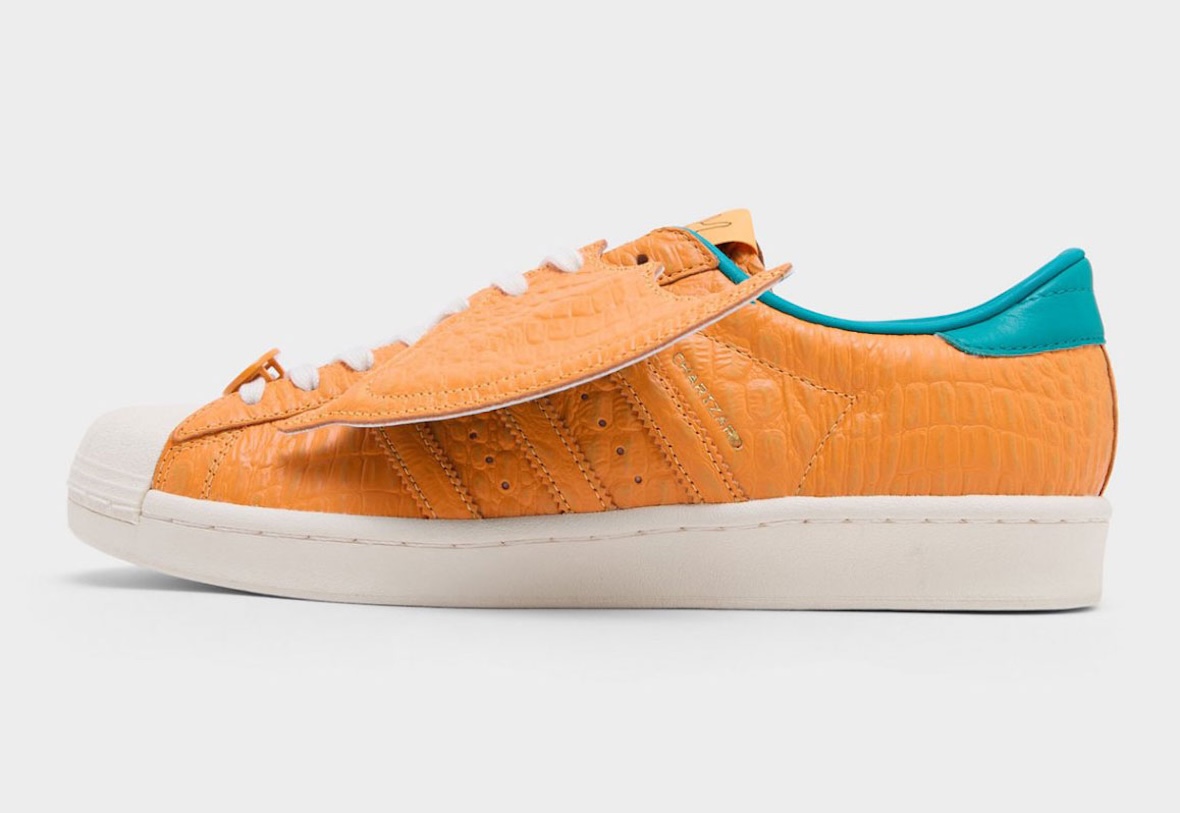 Pokemon x adidas Superstar Charizard 2026 orange scale texture upper and teal wing underside