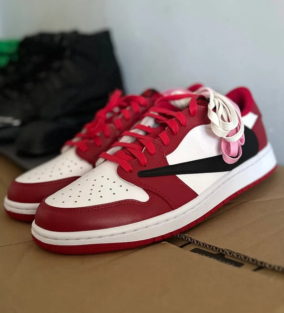 Travis Scott Air Jordan 1 Low Chicago 2027 side profile reverse swoosh detail