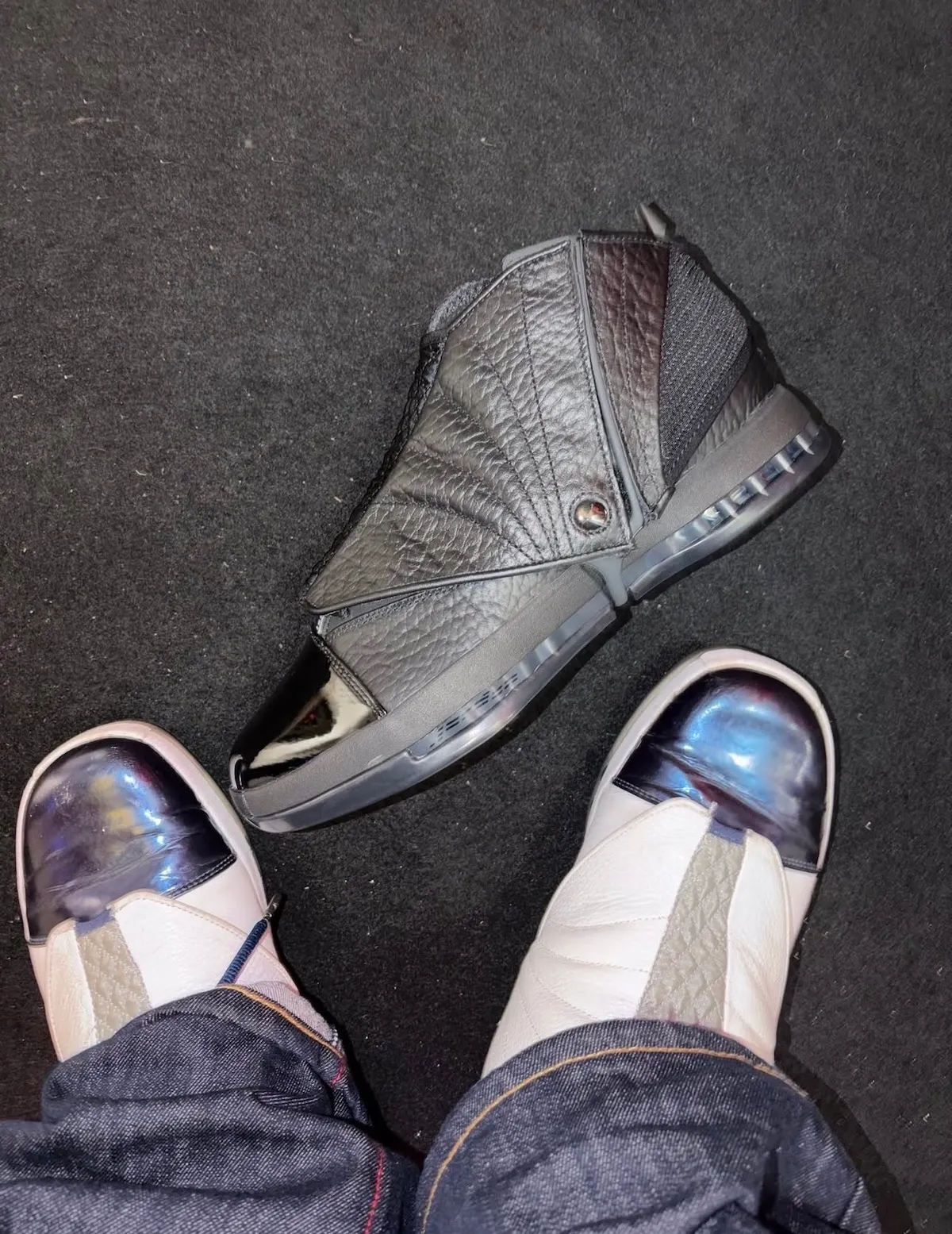 Air Jordan 16 Black Pack detail of tumbled leather upper and mesh tongue with shroud removed