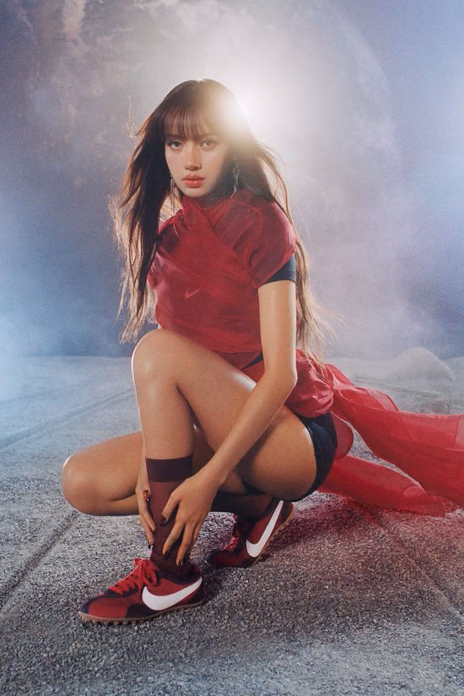 BLACKPINK Lisa in red colour-blocked outfit wearing Nike Moon Shoe Tough Red, October 2026 campaign