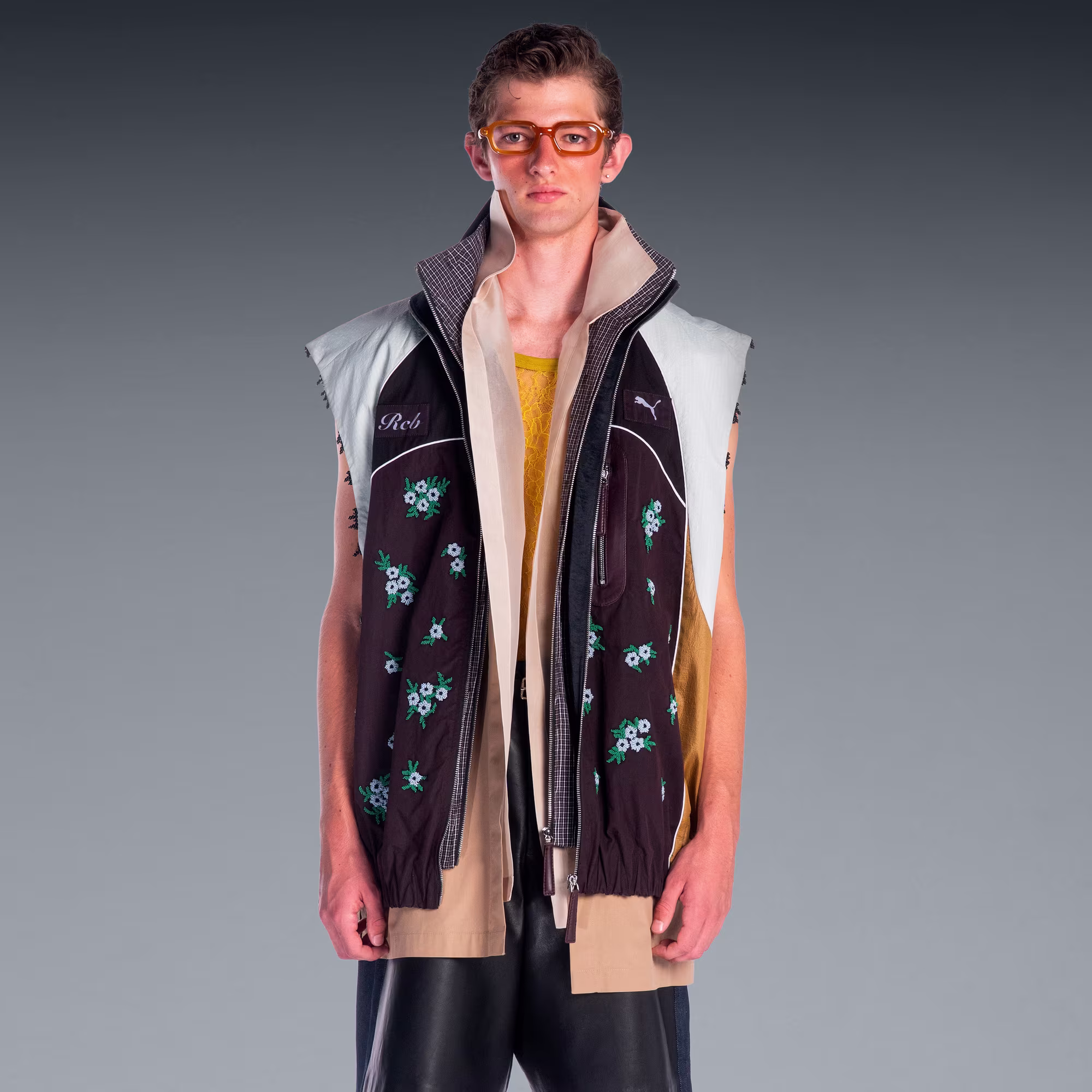 PUMA x RCB x Dhruv Kapoor Dual Front Sleeveless Jacket in PUMA Black, ₹55,999 on PUMA India