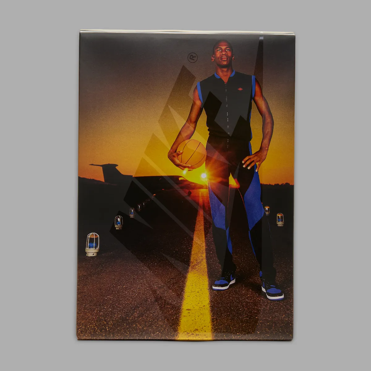 Air Jordan 1 High OG Royal 2026 shoe box printed with the 1985 Michael Jordan Oregon road photo