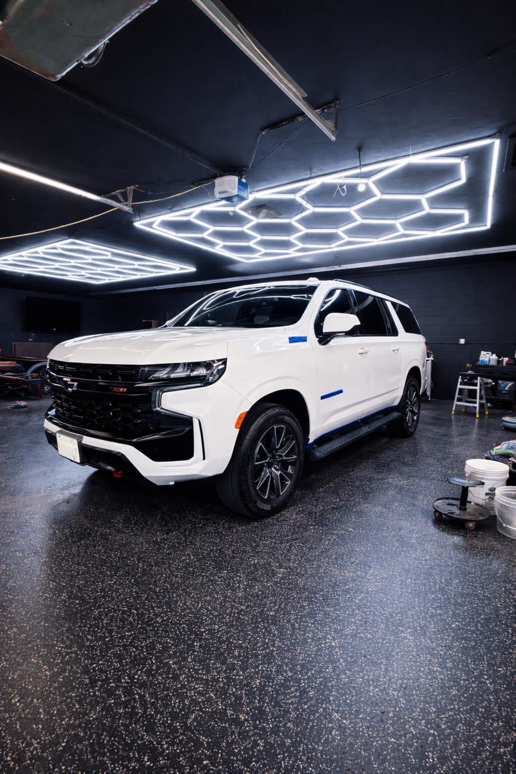 White Chevrolet Z71 ceramic coating prep in studio