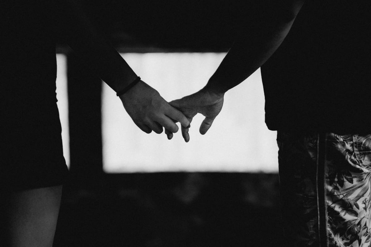 A couple talking intimately