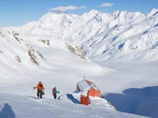 What Makes a Ski Traverse or Expedition Special? feature image - Ski tourers arriving at Tasman Saddle Hut, Aoraki Mount Cook National Park