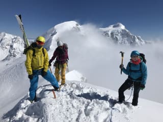 Ski Touring & Split-Boarding Adventures feature image - Ski mountaineers on the summit of Mt Alymer, Aoraki Mount Cook National Park