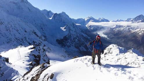 Winter Mountaineering Course | Learn Essential Alpine Skills in the Southern Alps - Climber near Ball Pass in winter conditions, Aoraki Mount Cook National Park 1