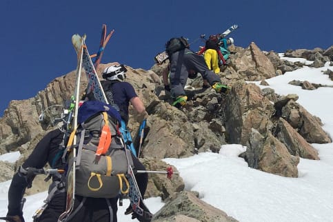 Ski Mount Cook Range - Fitness & Experience - Ski mountaineers climbing through snow and rock up Ball Ridge, Aoraki Mount Cook National Park