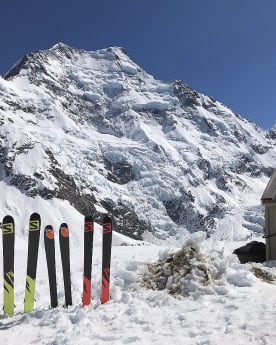 Articles - Caroline Hut Restock - Skis outside Caroline Hut, in front of the Caroline Face of Aoraki Mount Cook