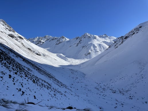 New Zealand Alpine Hikes, Trekking & Snowshoeing - New Zealand Snowshoe Hikes & Winter Treks - Cass Valley Snowshoeing - Early winter snow in Tin Hut Stream on the route to Falcon's Nest Hut, Cass Valley Snowshoeing Adventures - Remote wilderness snowshoeing in the Tekapo backcountry - Cass Valley Snowshoe Hikes 5