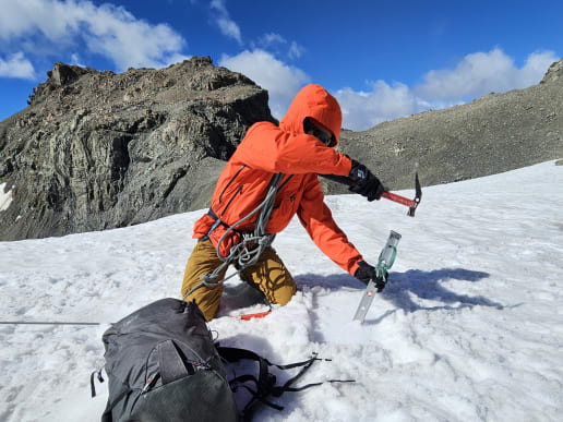 New Zealand Alpine Climbing, Mountaineering Instruction & Guided Ascents - Mountaineering Skills & Alpine Climbing Courses - Intensive Mountaineering Skills Course - Placing a top-clip snow anchor in firm snow on the Ball Glacier - Learn how to safely place a snow anchor for alpine climbing and crevasse rescue 5