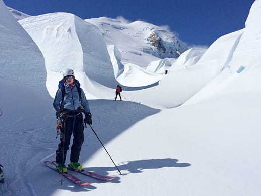New Zealand Backcountry Skiing & Split-boarding - New Zealand's Best Glacier Touring & Ski Mountaineering - Ski Mount Cook & Westland Glaciers - Skiing through Canyon Lands on the Tasman Glacier, She's on Skis - Skiers skiing through ice and glacier features on the Tasman Glacier, Aoraki Mount Cook National Park 1