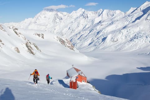 Venue: Tasman Saddle Hut (winter) - Ski tourers descending to Tasman Saddle Hut - Tasman Glacier, Aoraki Mount Cook