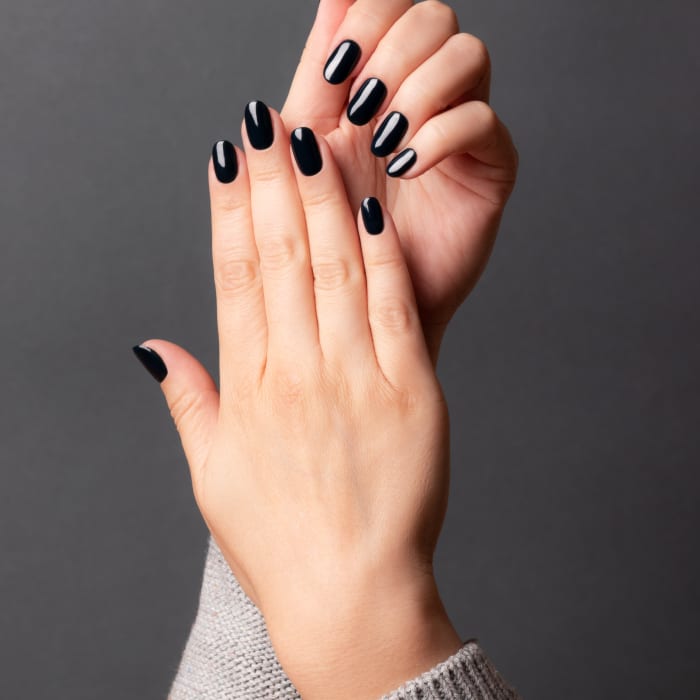 Glossy dark manicure