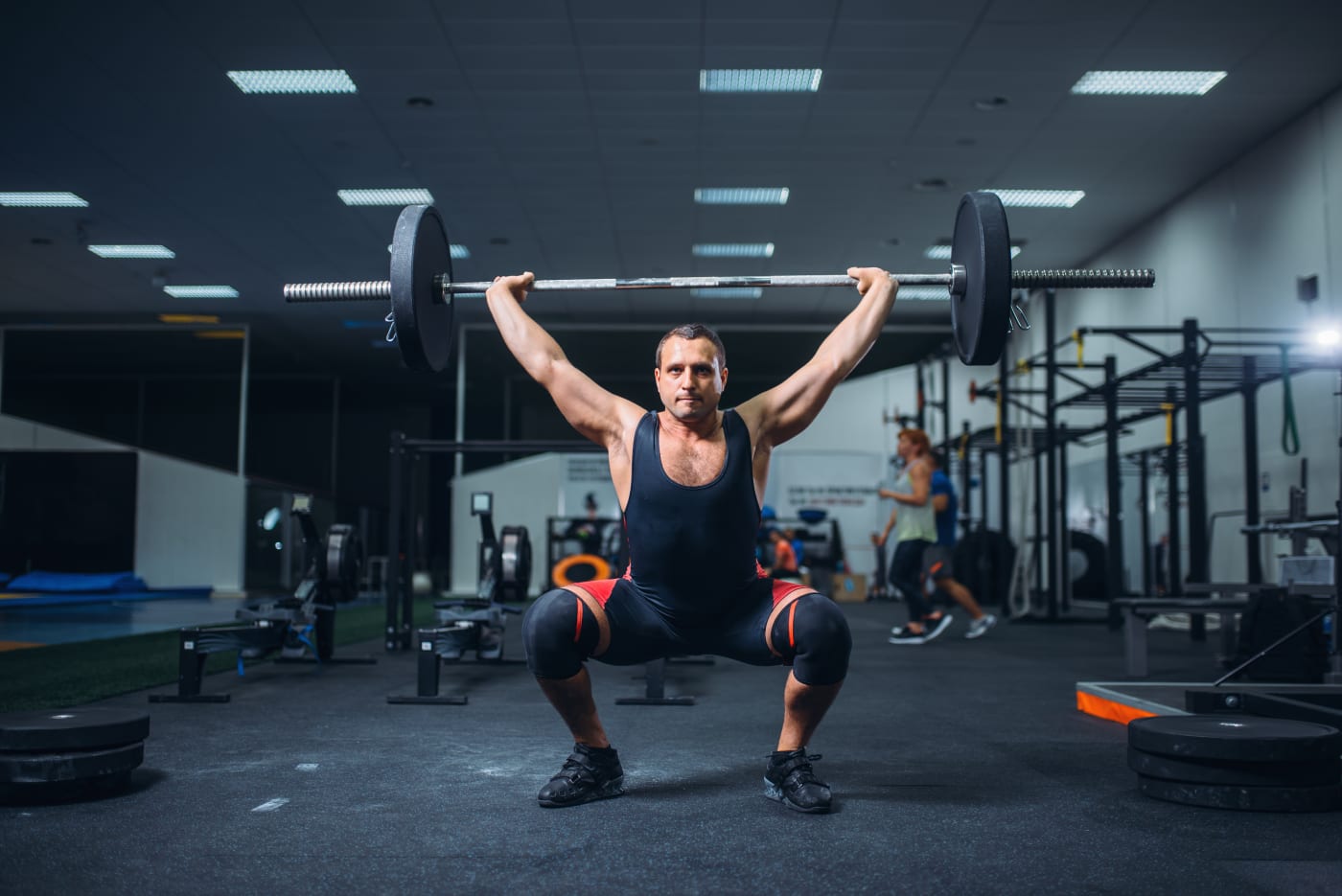Heavy barbell deadlift in a strength session