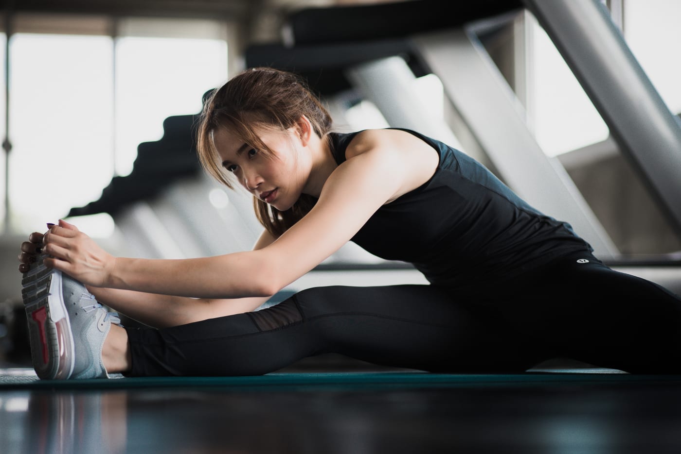 Athlete stretching during a mobility class