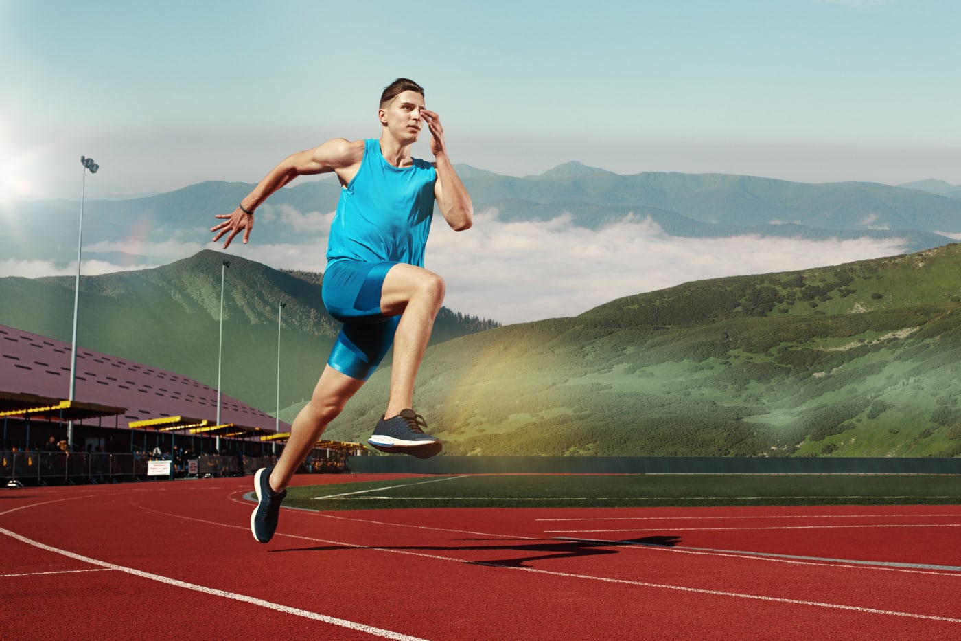 Athlete running on a track during conditioning