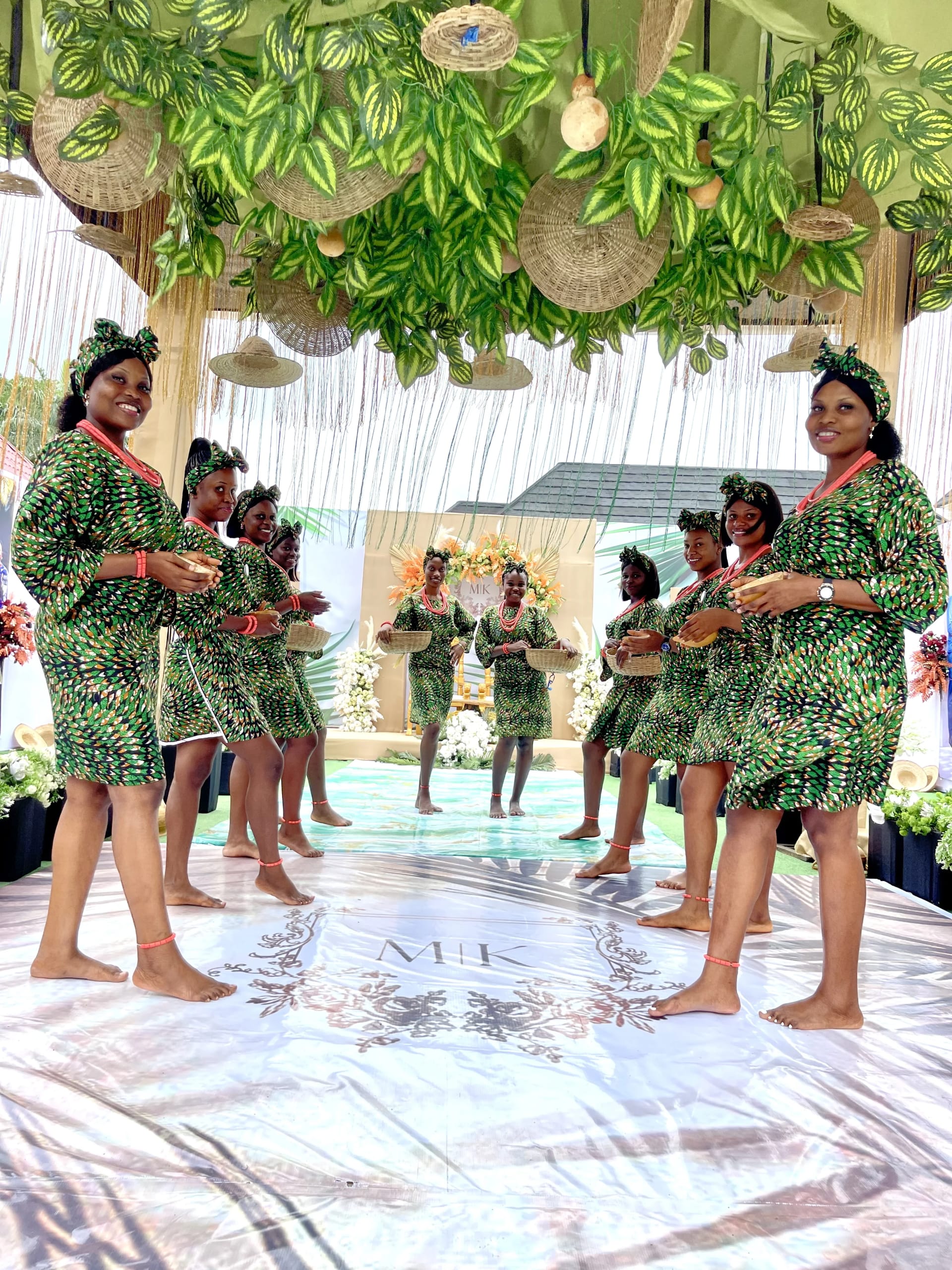 Team in green Ankara at traditional wedding ceremony