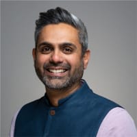 Dr. Ajit Menon