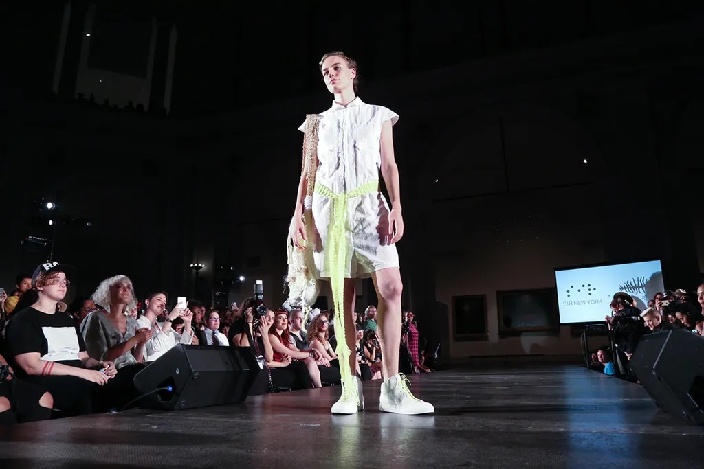 Community runway audience supporting rising talent