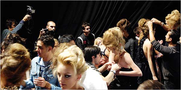 Backstage hair and styling preparation before a show