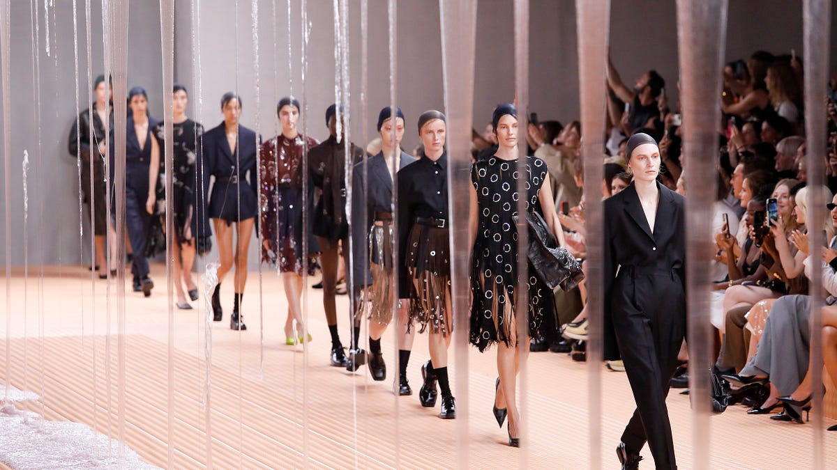 Models walking a fashion runway showcase