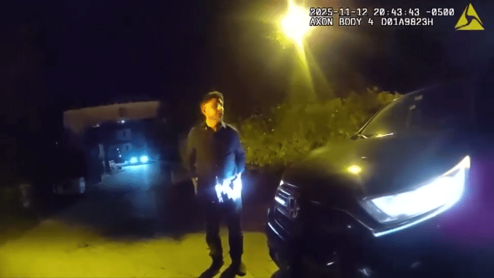 Bodycam image from Miami Beach police arrest of a yacht owner accused of trafficking teens