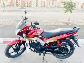 Moto Mahindra Centuro 110 en bon état