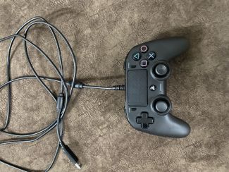 Manette PS4 fil bon état