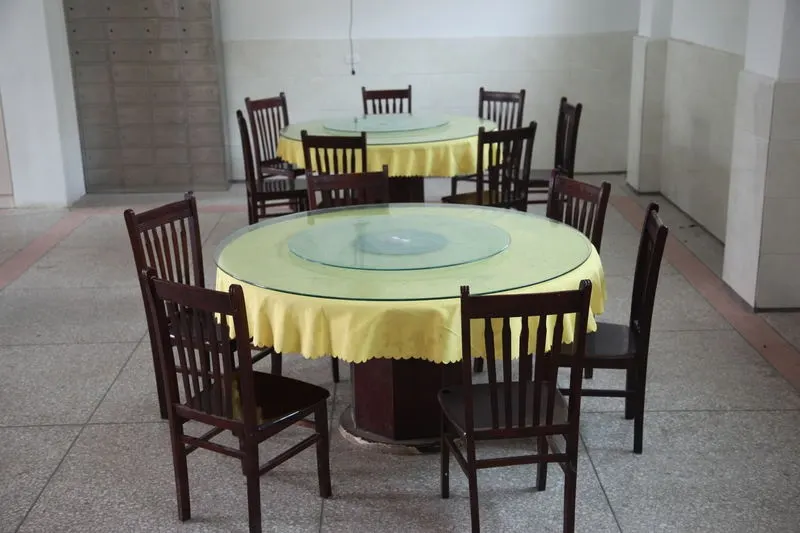 Dining area with round tables and simple seating