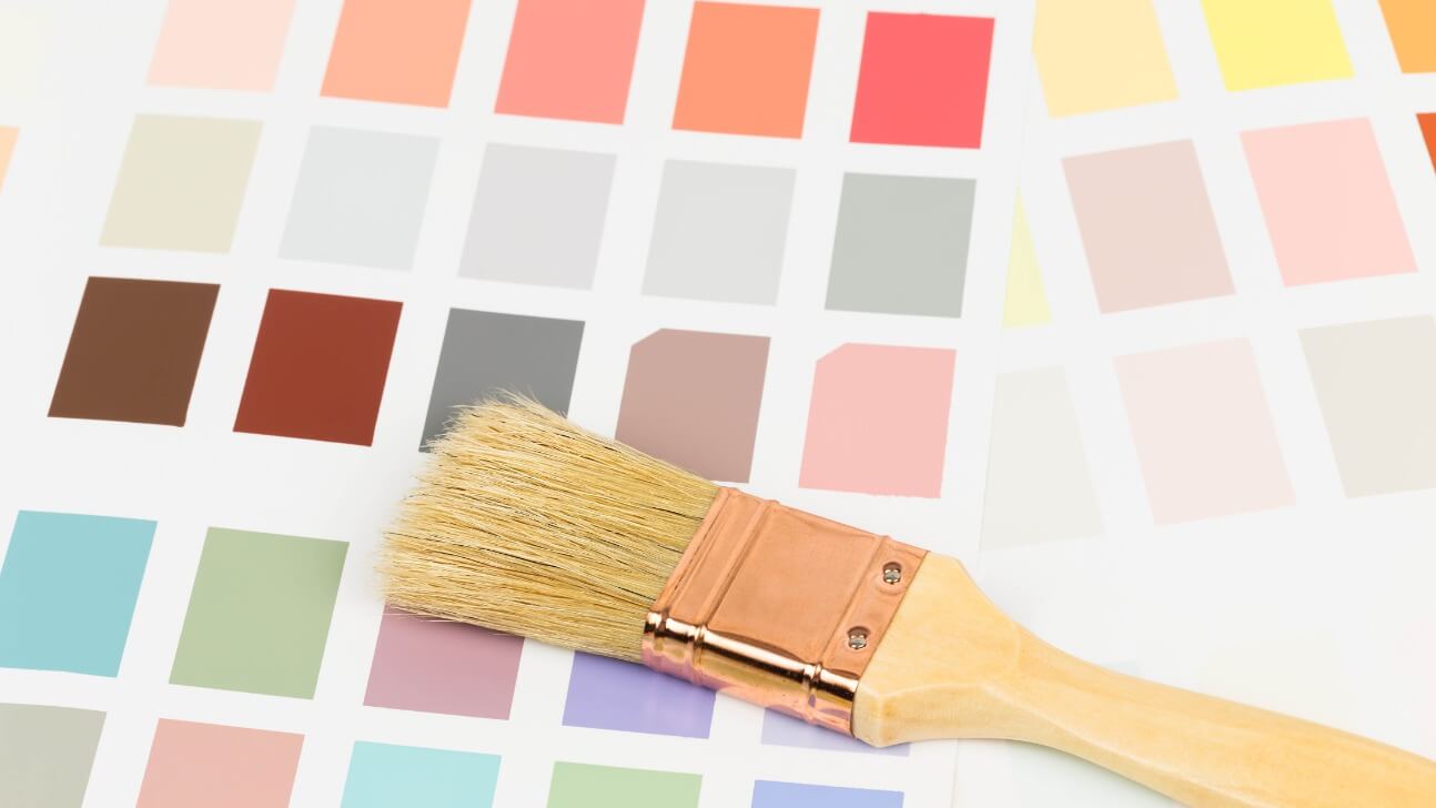 paint color sample catalog with brush and drawing